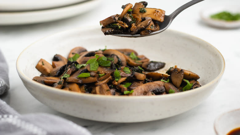 mushrooms and parsley in bowl
