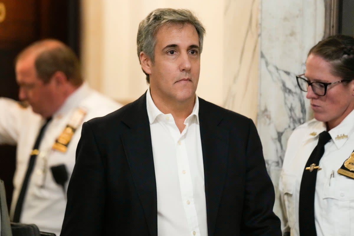 Michael Cohen enters New York Supreme Court on 25 October 2023 in New York (AP)