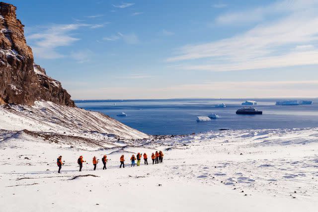 <p>Carol Sachs</p> Passengers on a land excursion to Brown Bluff, a dormant volcano on Antarctica’s Tabarin Peninsula.
