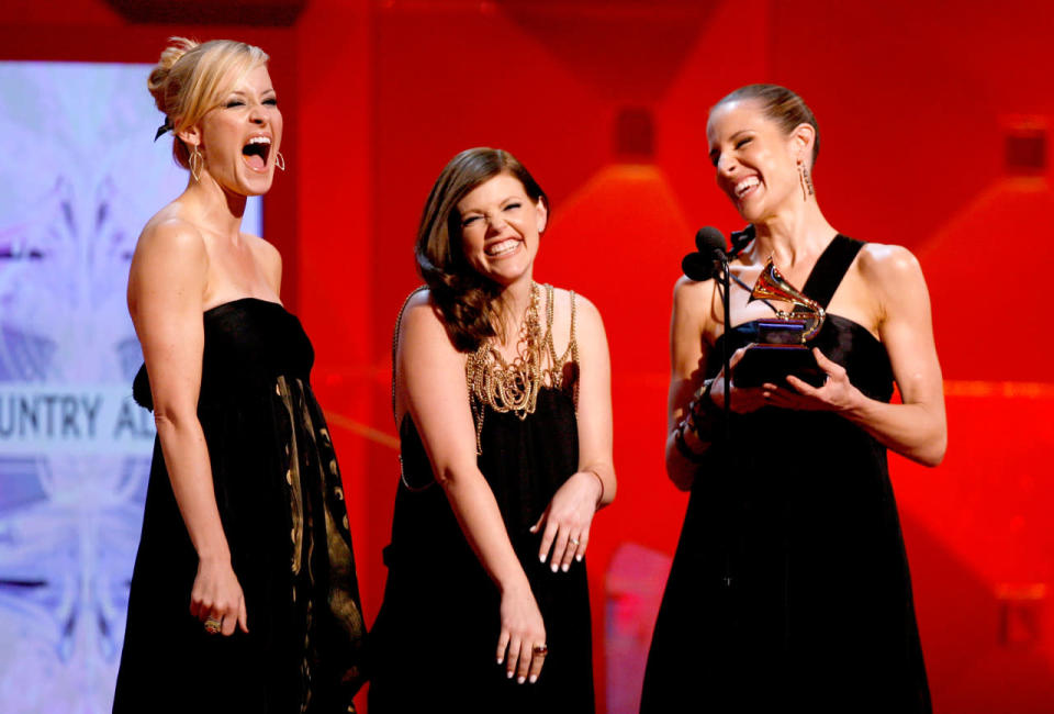 Dixie Chicks lost the 1998 Best New Artist award to hip-hop star Lauryn Hill. Eight years later, the then-embattled country trio took Album of the Year for their fourth major-label studio album, Taking the Long Way.