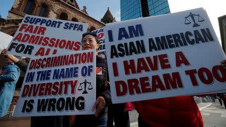 Supporters attend the "Rally for the American Dream - Equal Education Rights for All," ahead of the start of the trial in a lawsuit accusing Harvard University of discriminating against Asian-American applicants, in Boston, October 14, 2018. REUTERS/Brian Snyder