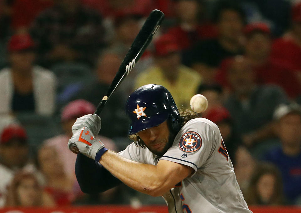 ANAHEIM, CALIFORNIA - JULY 16: Jake Marisnick #6 of the Houston Astros is hit by a pitch in the sixth inning of the MLB game against the Los Angeles Angels at Angel Stadium of Anaheim on July 16, 2019 in Anaheim, California. (Photo by Victor Decolongon/Getty Images)