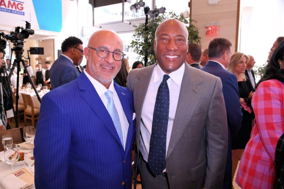 (Left to right) Jim Cantore and Byron Allen attend the Allen Media Group upfront presentation on April 26, 2023 at Avra in New York City. (Photo by Chance Yeh/Getty Images for Allen Media Group / The Weather Channel)