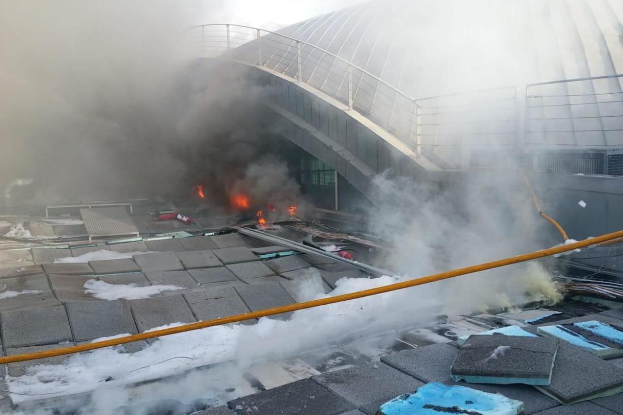Dozens of firefighters are still tackling the fire which ripped through the terminal roof on Wednesday: Alicante City Council