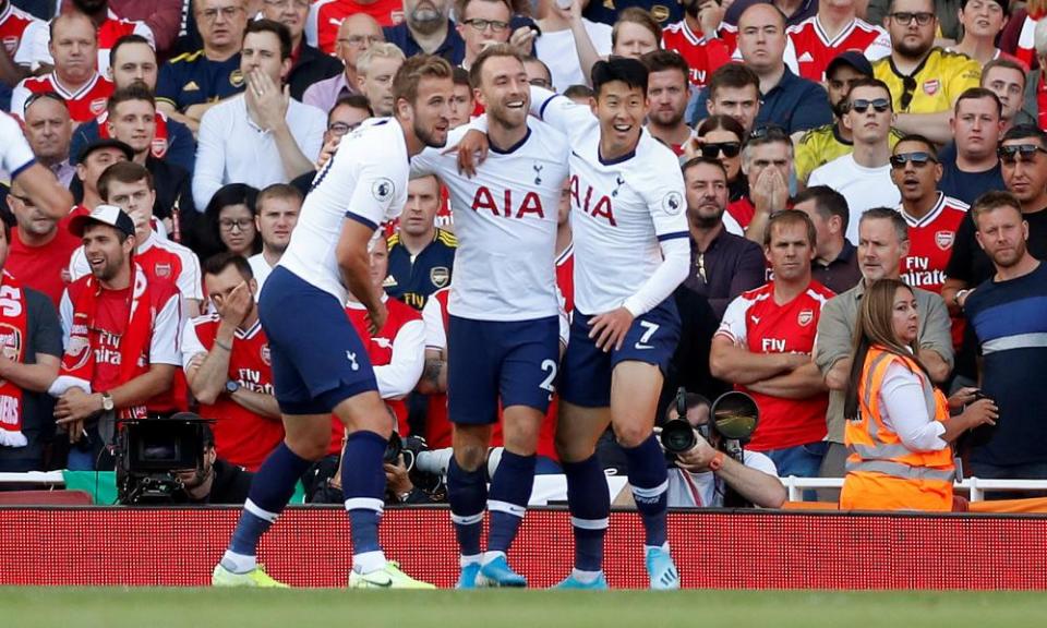 Christian Eriksen is congratulated by Harry Kane and Son Heung-min after scoring against Arsenal in September 2019