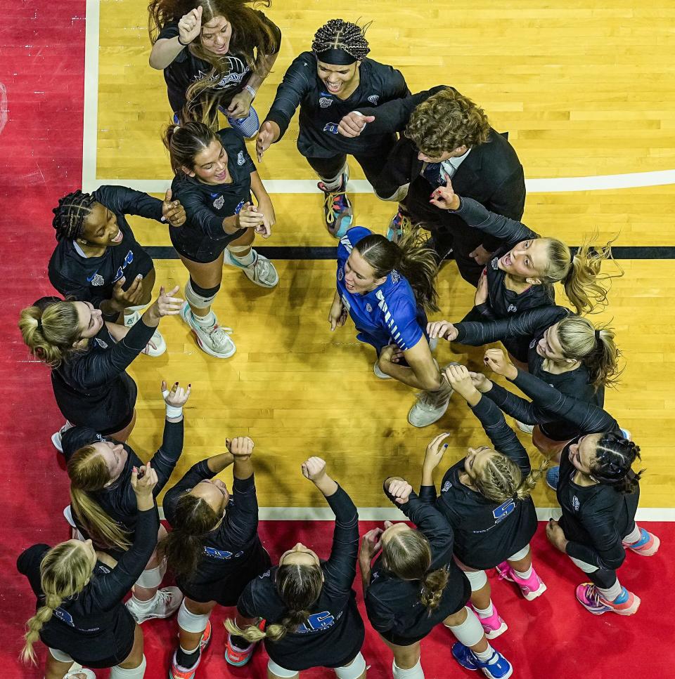 Hamilton Southeastern Royals cheer together Saturday, Nov. 4, 2023, ahead of the IHSAA Class 4A state championship game at Worthen Arena in Muncie. The Hamilton Southeastern Royals defeated the Castle Knights, 3-1.