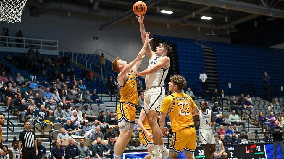 University of North Florida junior guard Nate Lliteras goes high to score against Lipscomb in last week's 85-76 victory.