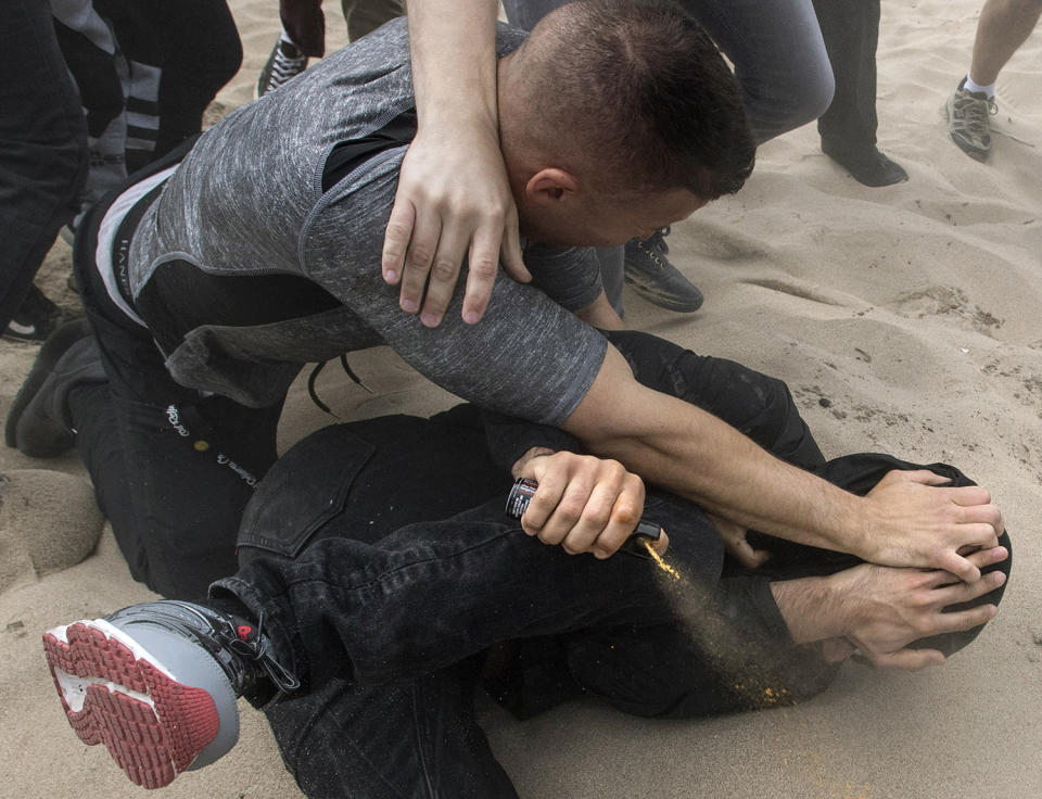 Violence erupts at pro-Trump rally on California beach