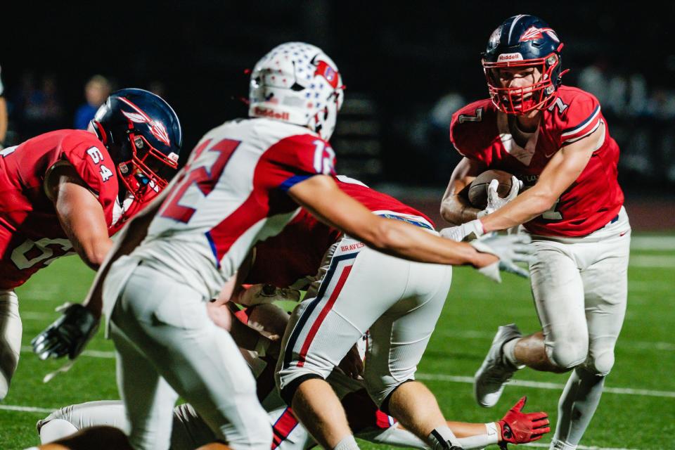 Indian Valley's Kolton Thomas picks up yardage on a run against Garaway during week 7 high school football action, Friday, Sept. 29th at Braves Stadium in Gnadenhutten, Ohio.