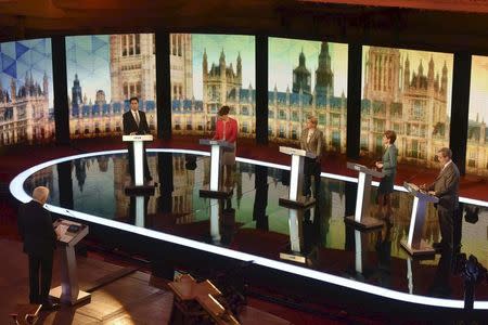 (L-R) Britain's opposition Labour Party leader Ed Miliband, Plaid Cymru leader Leanne Wood, Green Party leader Natalie Bennett, SNP leader Nicola Sturgeon and UKIP leader Nigel Farage participate in the televised leaders' debate in London, April 16, 2015. REUTERS/Jeff Overs/BBC/Handout via Reuters ATTENTION EDITORS - THIS PICTURE WAS PROVIDED BY A THIRD PARTY. REUTERS IS UNABLE TO INDEPENDENTLY VERIFY THE AUTHENTICITY, CONTENT, LOCATION OR DATE OF THIS IMAGE. THIS PICTURE IS DISTRIBUTED EXACTLY AS RECEIVED BY REUTERS, AS A SERVICE TO CLIENTS. FOR EDITORIAL USE ONLY. NOT FOR SALE FOR MARKETING OR ADVERTISING CAMPAIGN. NO SALES. NO ARCHIVES. NO COMMERCIAL USE.