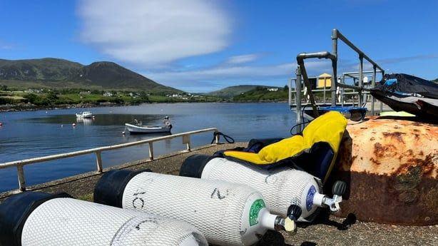 Picture of boat with diving cannisters