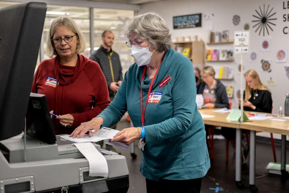 PHOTO: A poll worker enters absentee ballots at the Madison Public Library, Nov. 8, 2022 in Madison, Wisconsin. (Jim Vondruska/Getty Images, FILE)