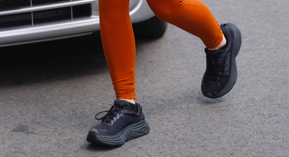 Olivia Wilde shoes, hoka sneakers. 