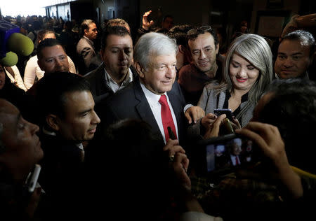 Andres Manuel Lopez Obrador leaves after being sworn-in as presidential candidate of the National Regeneration Movement (MORENA) during the party's convention at a hotel in Mexico City, Mexico February 18, 2018. REUTERS/Henry Romero