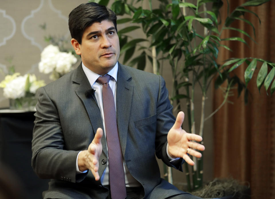 In this Monday, March 11, 2019, photo, Costa Rican president Carlos Alvarado gestures as he takes part in an interview with The Associated Press in Seattle. Alvarado said that Central America should not be satisfied until Nicaragua holds free elections and re-establishes a free press, democracy and human rights guarantees, and that turmoil in Nicaragua is having an impact on regional immigration and the economy. (AP Photo/Ted S. Warren)