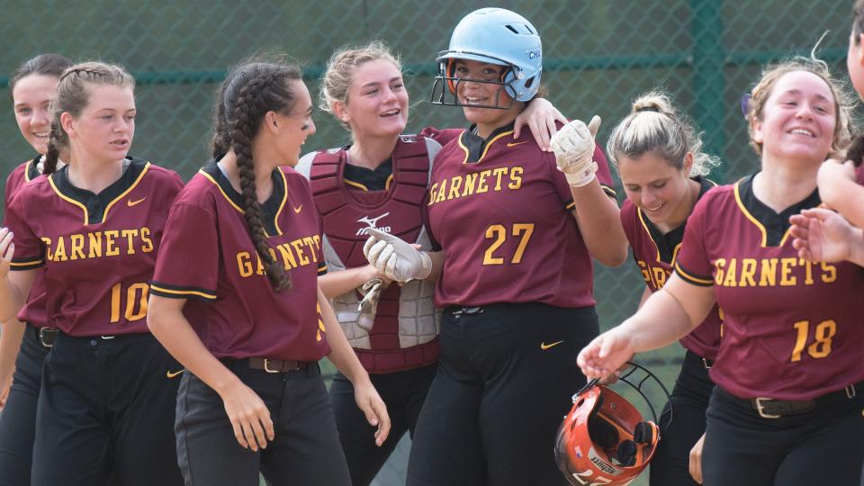 Haddon Heights’ Sophia Bordi, center, is congratulated by her teammates after Bordi hit her first of three home runs during the South Jersey Group 2 softball championship game between Haddon Heights and Cedar Creek played at Cedar Creek High School on Thursday, May 26, 2022.  Haddon Heights defeated Cedar Creek, 8-0.   