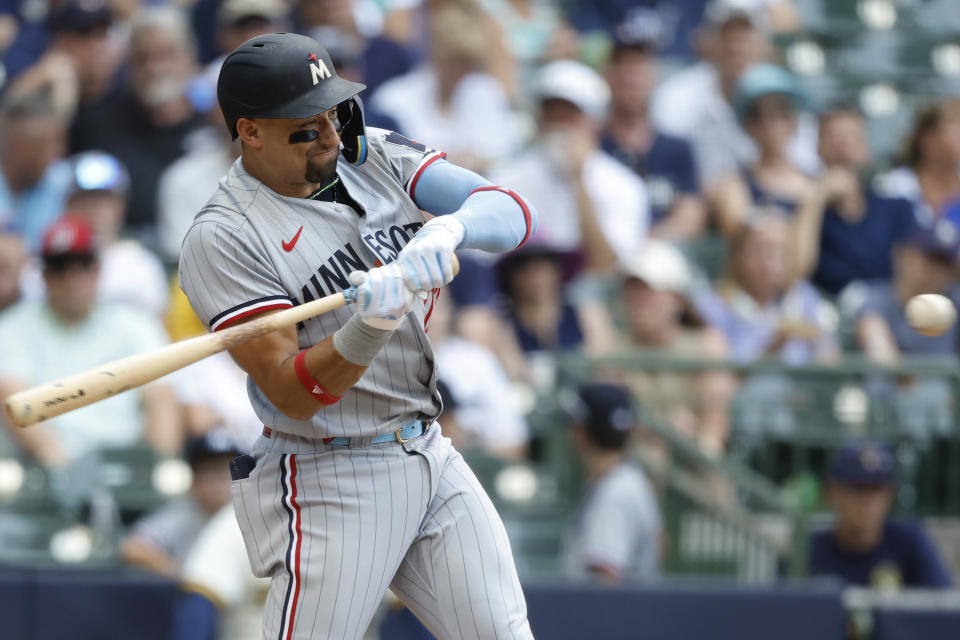 Minnesota Twins' Royce Lewis hits a two-run home run against the Milwaukee Brewers during the third inning of a baseball game Wednesday, Aug 23, 2023, in Milwaukee. (AP Photo/Jeffrey Phelps)