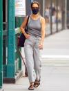 <p>Katie Holmes steps out for a stroll in jeans and a tank top on Tuesday in New York City. </p>