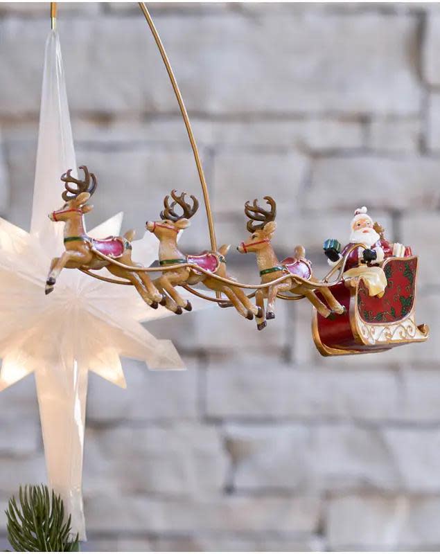 <p><a href="https://go.redirectingat.com?id=74968X1596630&url=https%3A%2F%2Fwww.balsamhill.com%2Fp%2Fsantas-sleigh-animated-christmas-tree-topper%3Fsku%3D4003828&sref=https%3A%2F%2Fwww.townandcountrymag.com%2Fleisure%2Fg42145590%2Fbest-christmas-tree-topper-ideas%2F" rel="nofollow noopener" target="_blank" data-ylk="slk:Shop Now;elm:context_link;itc:0;sec:content-canvas" class="link ">Shop Now</a></p><p>Santa's Sleigh Animated Tree Topper</p><p>balsamhill.com</p><p>$99.00</p>