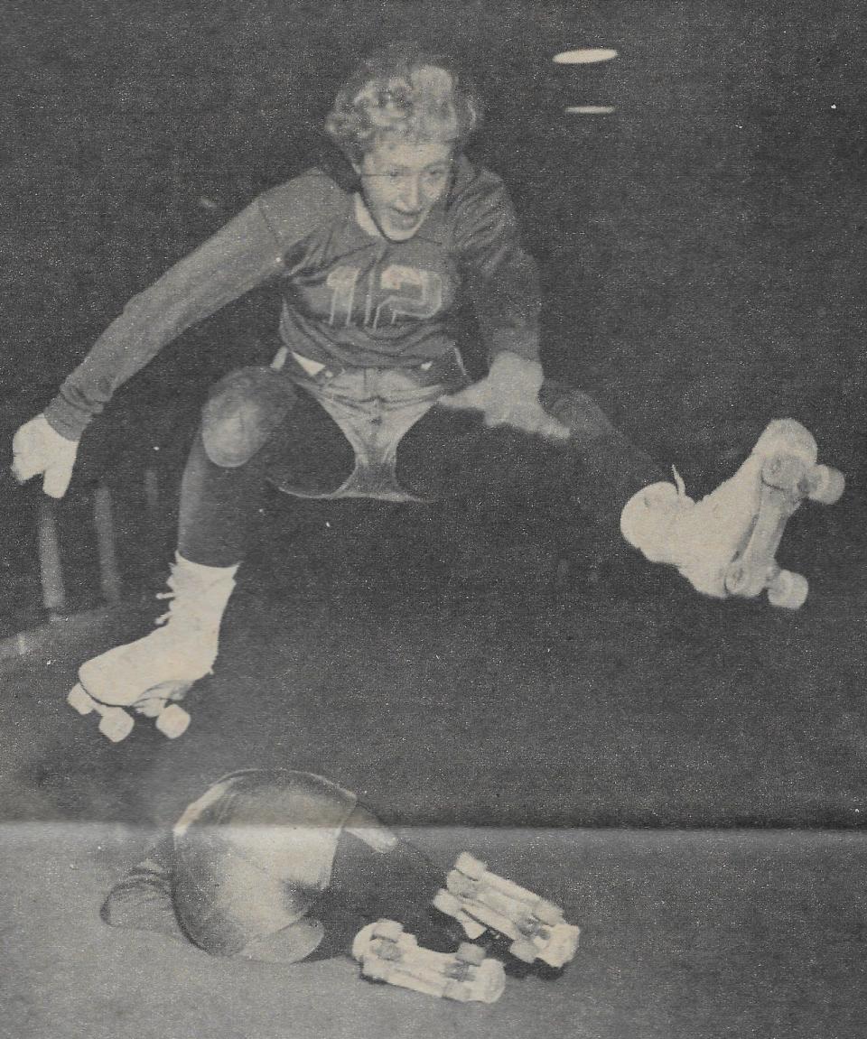 Roller derby star Joan Kazmerski jumps over a hapless opponent in the 1960s. This image is from a Beacon Journal clipping.