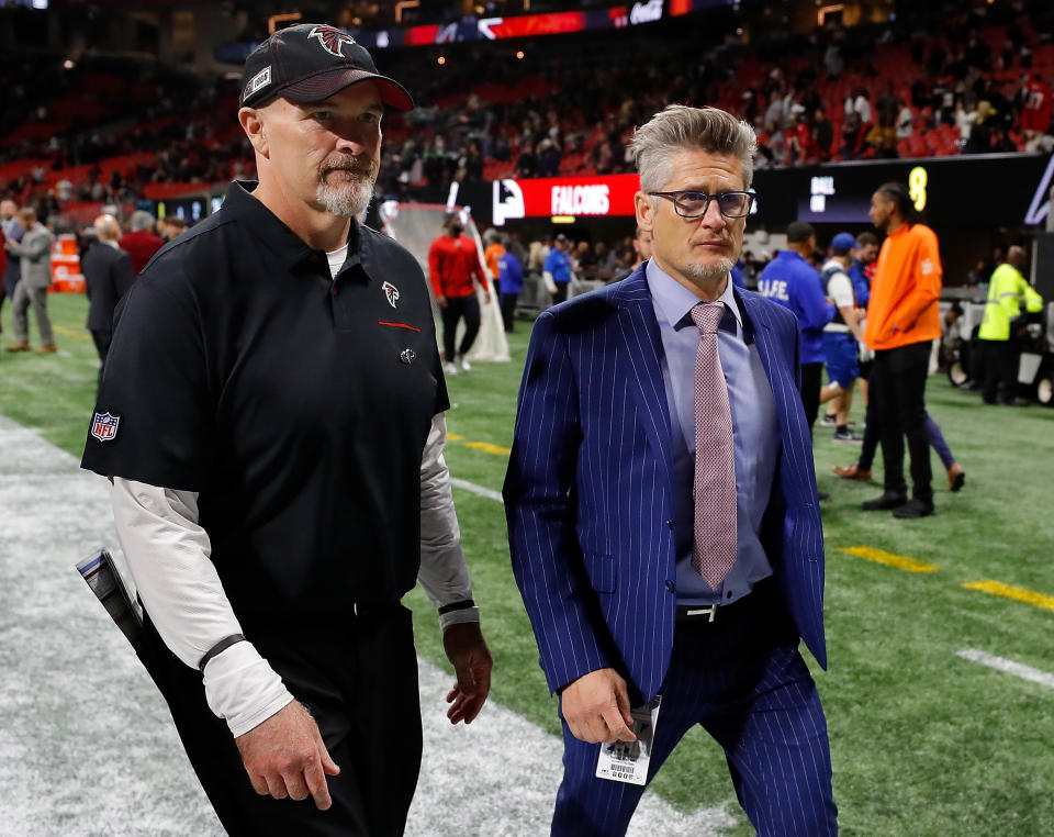 Atlanta Falcons head coach Dan Quinn and general manager Thomas Dimitroff took part in a protest march over the weekend. (Kevin C. Cox/Getty Images)