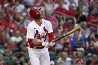 St. Louis Cardinals' Dylan Carlson watches his sacrifice fly to score Edmundo Sosa during the third inning of a baseball game against the Miami Marlins Wednesday, June 29, 2022, in St. Louis. (AP Photo/Jeff Roberson)