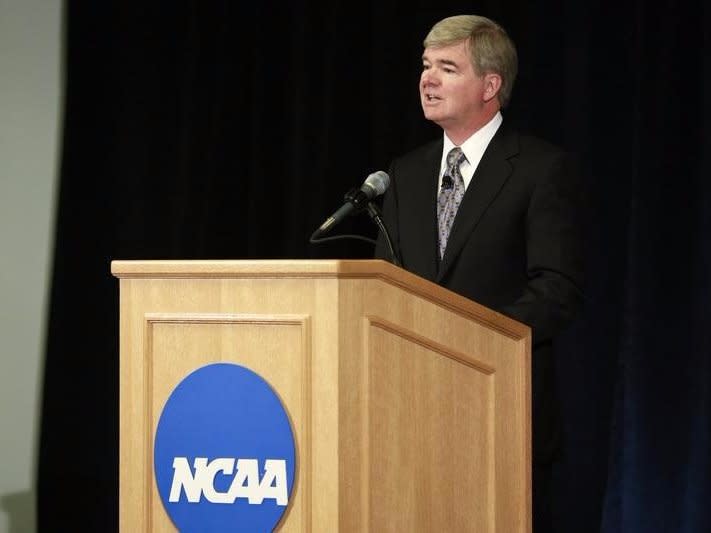 President of the National Collegiate Athletic Association (NCAA) Mark Emmert speaks during a news conference at the NCAA headquarters in Indianapolis July 23, 2012.   REUTERS/Brent Smith