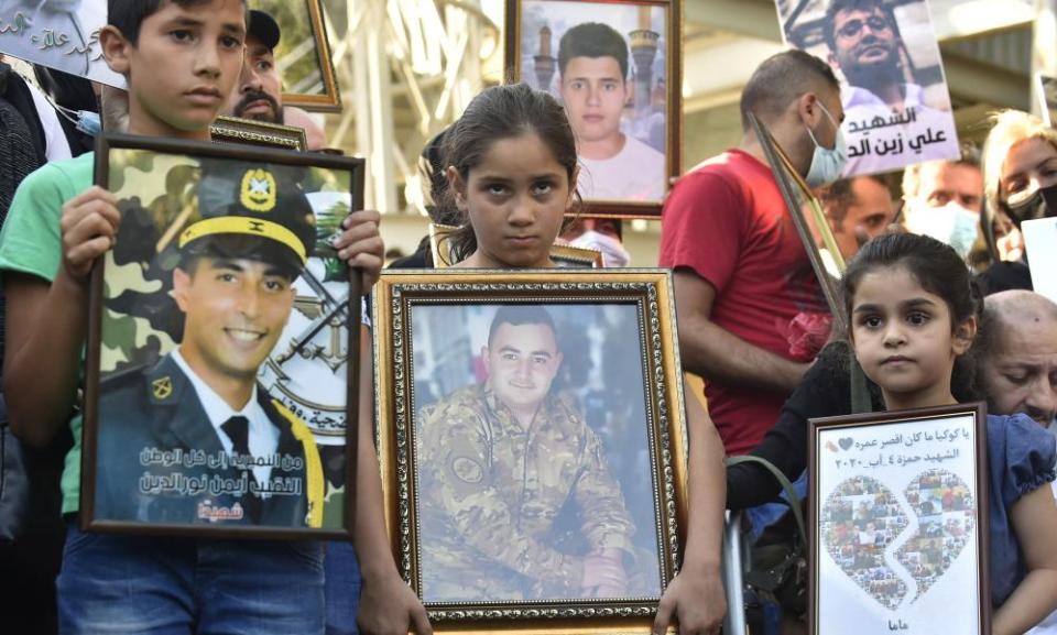 Relatives of those who died in the Beirut explosion stage a protest that those responsible have not been brought to justice almost a year on.