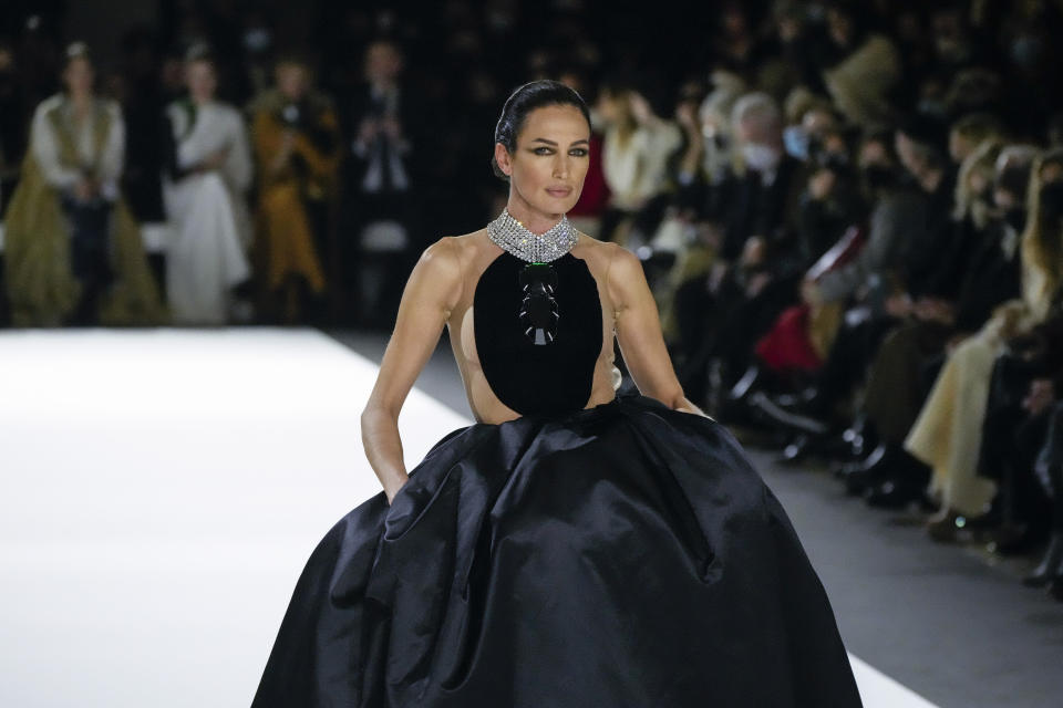 Nueves Alvarez wears a creation for the Stephane Rolland Spring-Summer 2022 Haute Couture fashion collection collection, in Paris, Tuesday, Jan. 25, 2022. (AP Photo/Francois Mori)