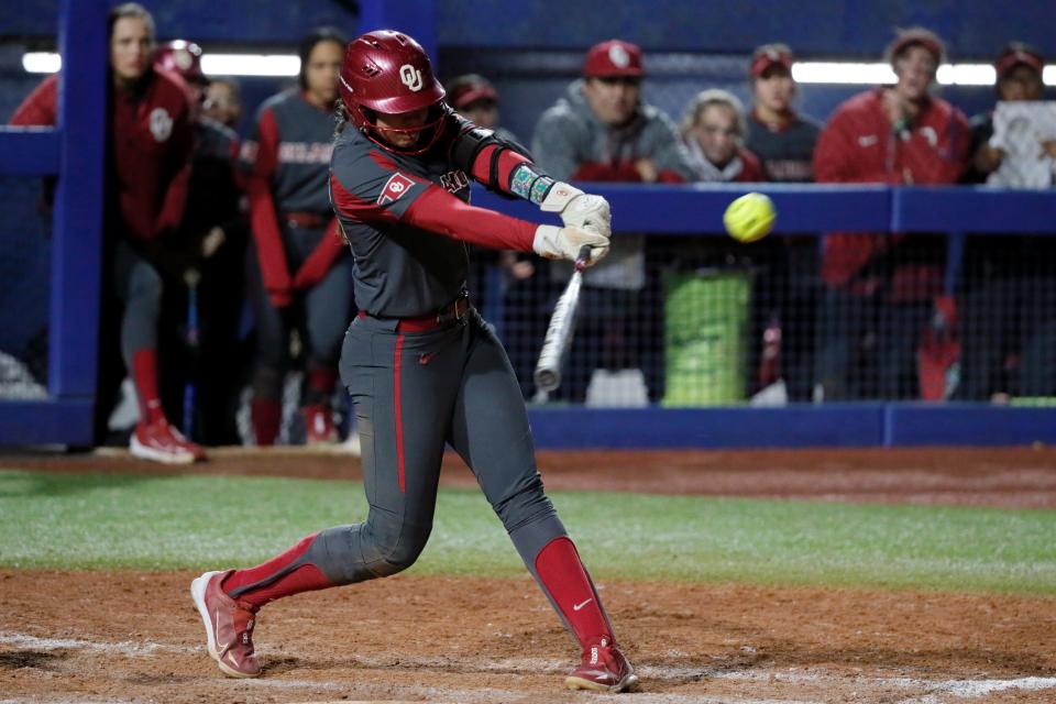 Oklahoma's Tiare Jennings (23) drives in a run in the sixth inning of a college softball game between the University of Oklahoma Sooners (OU) and the Northwestern Wildcats at USA Softball Hall of Fame Stadium in Oklahoma City, Friday, March 17, 2023. Oklahoma won 2-1. 