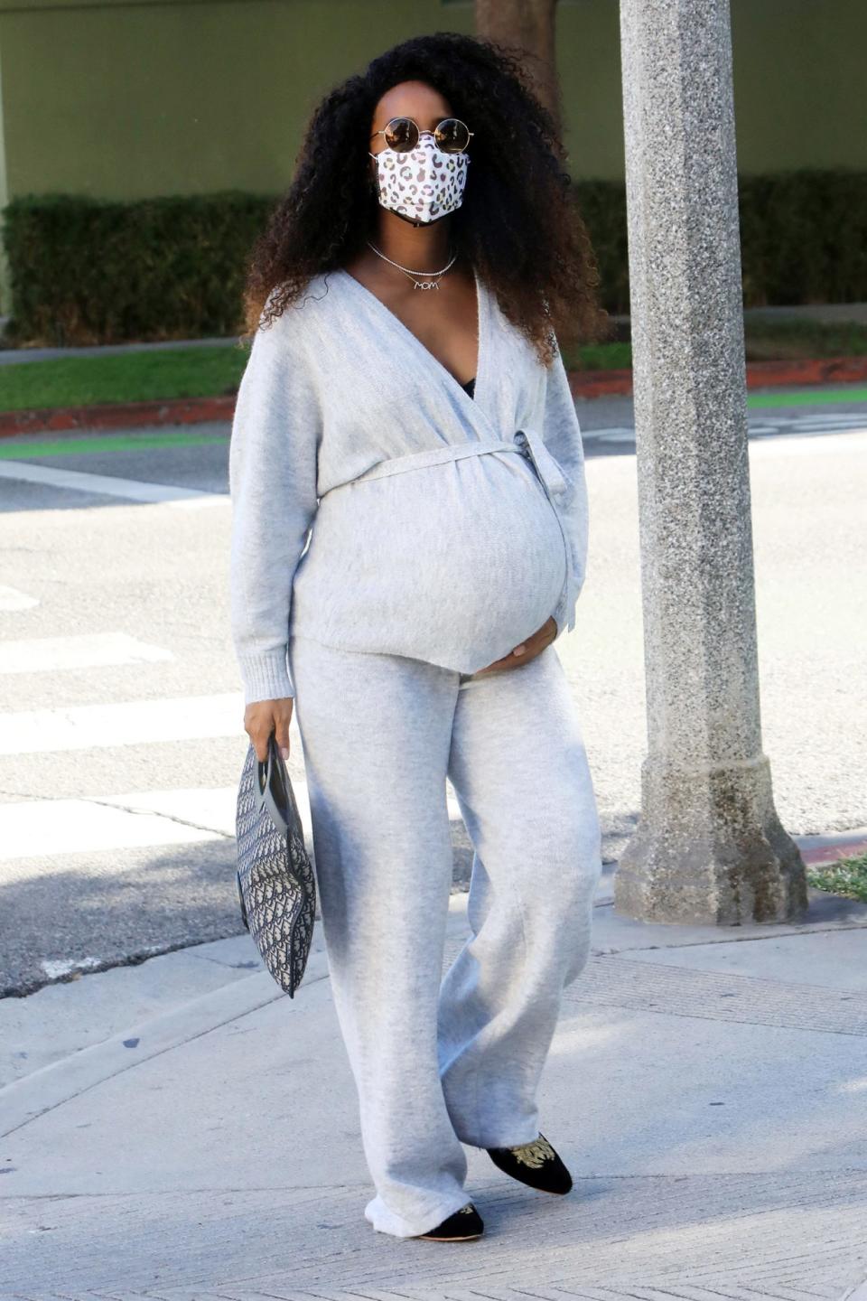 <p>A cozy-looking Kelly Rowland dons her mask and her sunglasses for a visit to the doctor in L.A. on Thursday.</p>