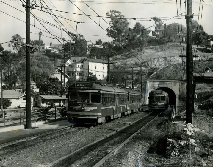 Pacific Electric cars making final runs through the mile-long subway before before its abandonment. This end of the tunnel was at 2nd ST. and Glendale Blvd. in Los Angeles.