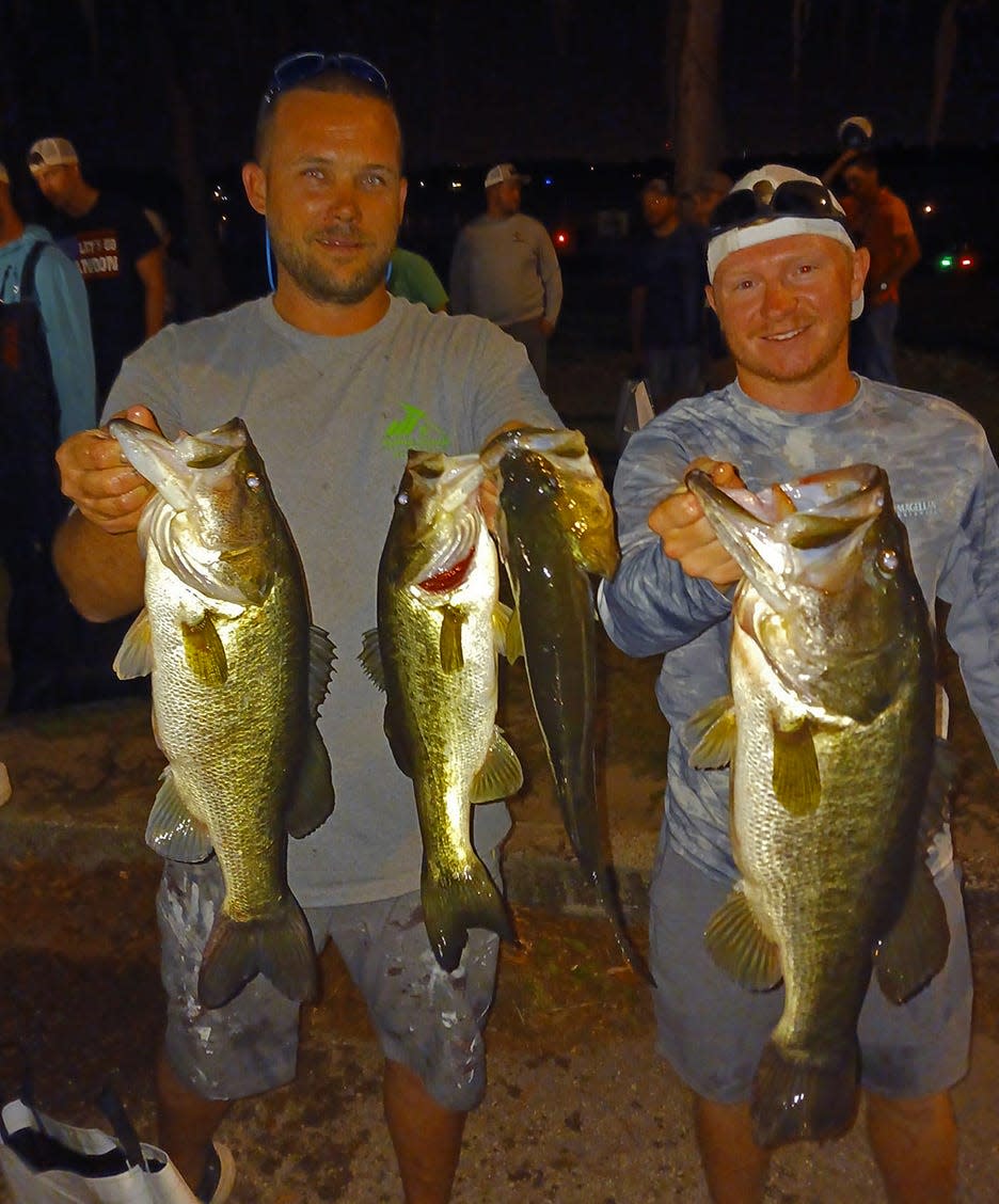 Josh Whitchard, left, and Jacob Shou had 15.33 pounds to win the Thursday Night Open Series tournament March 31 on the Winter Haven South Chain. Whitchard and Shou also tied with the team of Tanner Pope and Kevin Pope for big bass with a 6.71 pounder. 