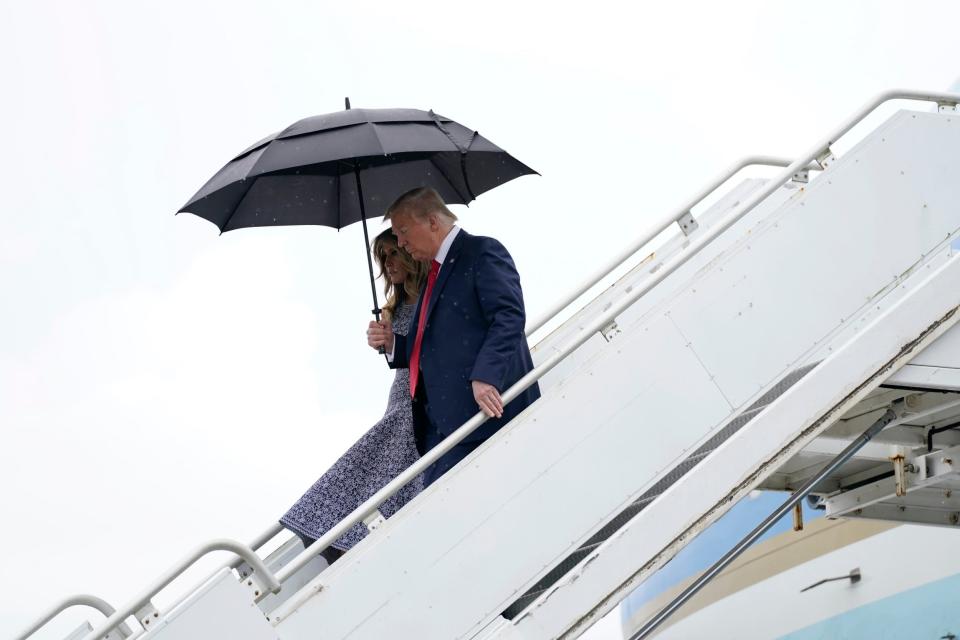 Donald Trump and first lady Melania Trump arrive at the Nasa Shuttle Landing Facility in Florida: AP