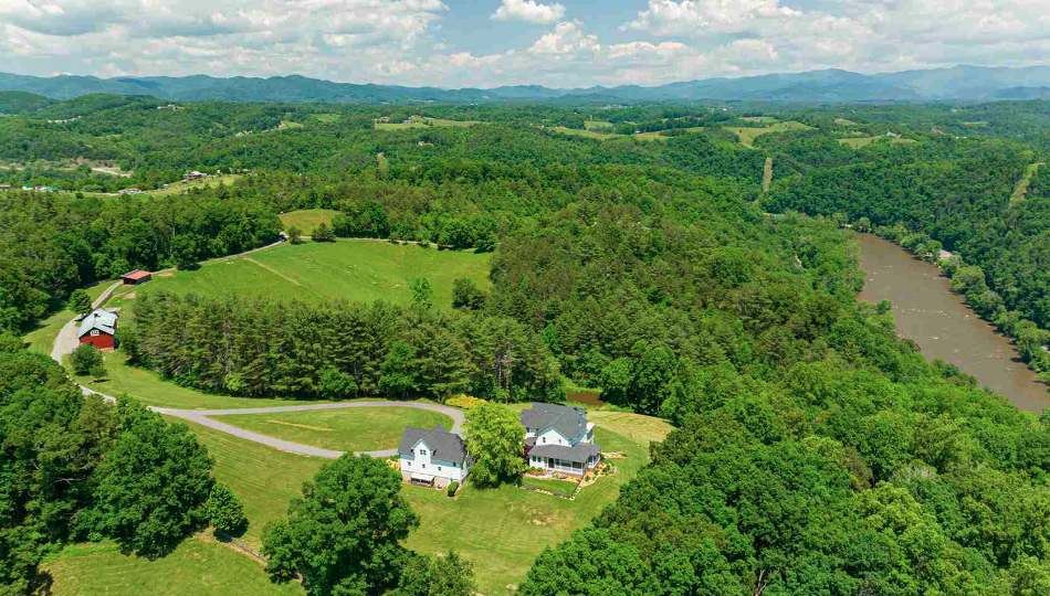 714 Frank Rector Rd, which is listed at $5.25 million, is the most-expensive house currently for sale in Madison County. The home sits on 62-acres and has 1,600 feet of French Broad River frontage.