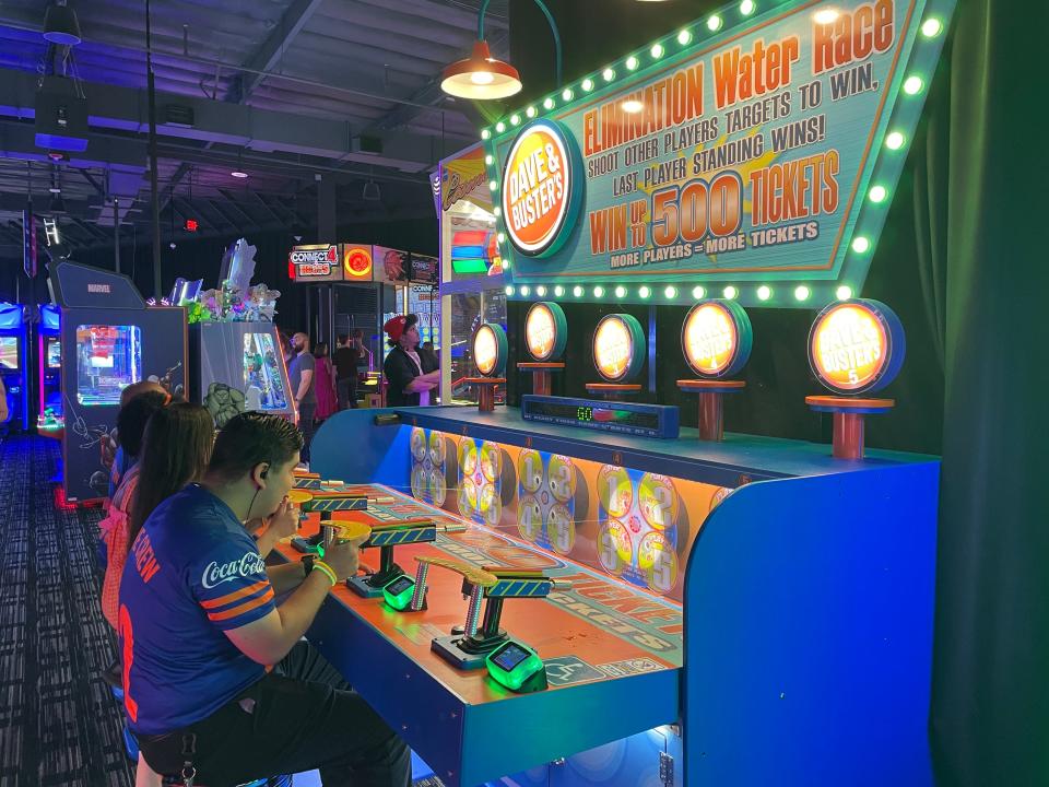 Guests play the Eliminated Water Race game at Dave & Buster's in Rancho Mirage on Thursday, Sept. 14, 2023.