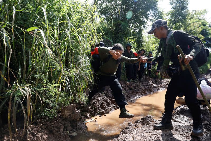 The Wider Image: In Myanmar jungle, civilians prepare to battle military rulers