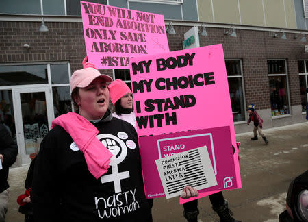 Pro-Choice supporters of Planned Parenthood rally outside a Planned Parenthood clinic in Detroit, Michigan, U.S. February 11, 2017. REUTERS/Rebecca Cook