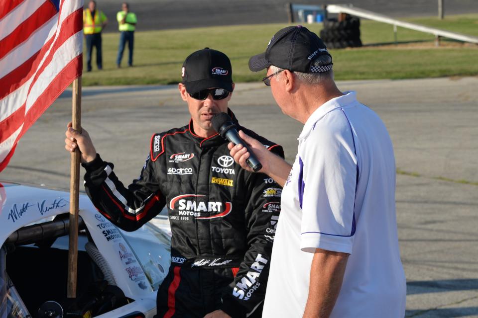 NASCAR driver Matt Kenseth is interviewed by Slinger Speedway track announcer Todd Behling after being the fastest qualifier for the 2016 Slinger Nationals.
