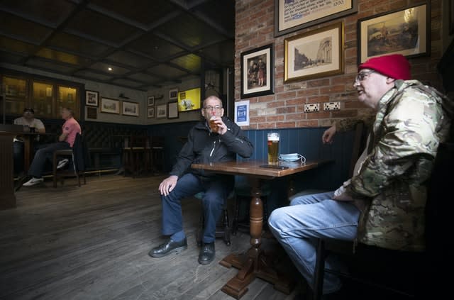 Customers at a pub in Edinburgh