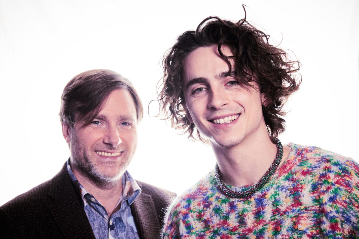 "Wonka" director Paul King, left, and star Timothée Chalamet pose for a portrait in London.