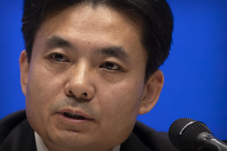 Yang Guang, spokesman for the Chinese Cabinet's Hong Kong and Macao Affairs Office, speaks during a press conference in Beijing, Tuesday, Aug. 6, 2019. A Chinese official responsible for Hong Kong affairs says punishment for those behind weeks of sometimes violent protests in the Chinese special administrative region is "only a matter of time." (AP Photo/Mark Schiefelbein)