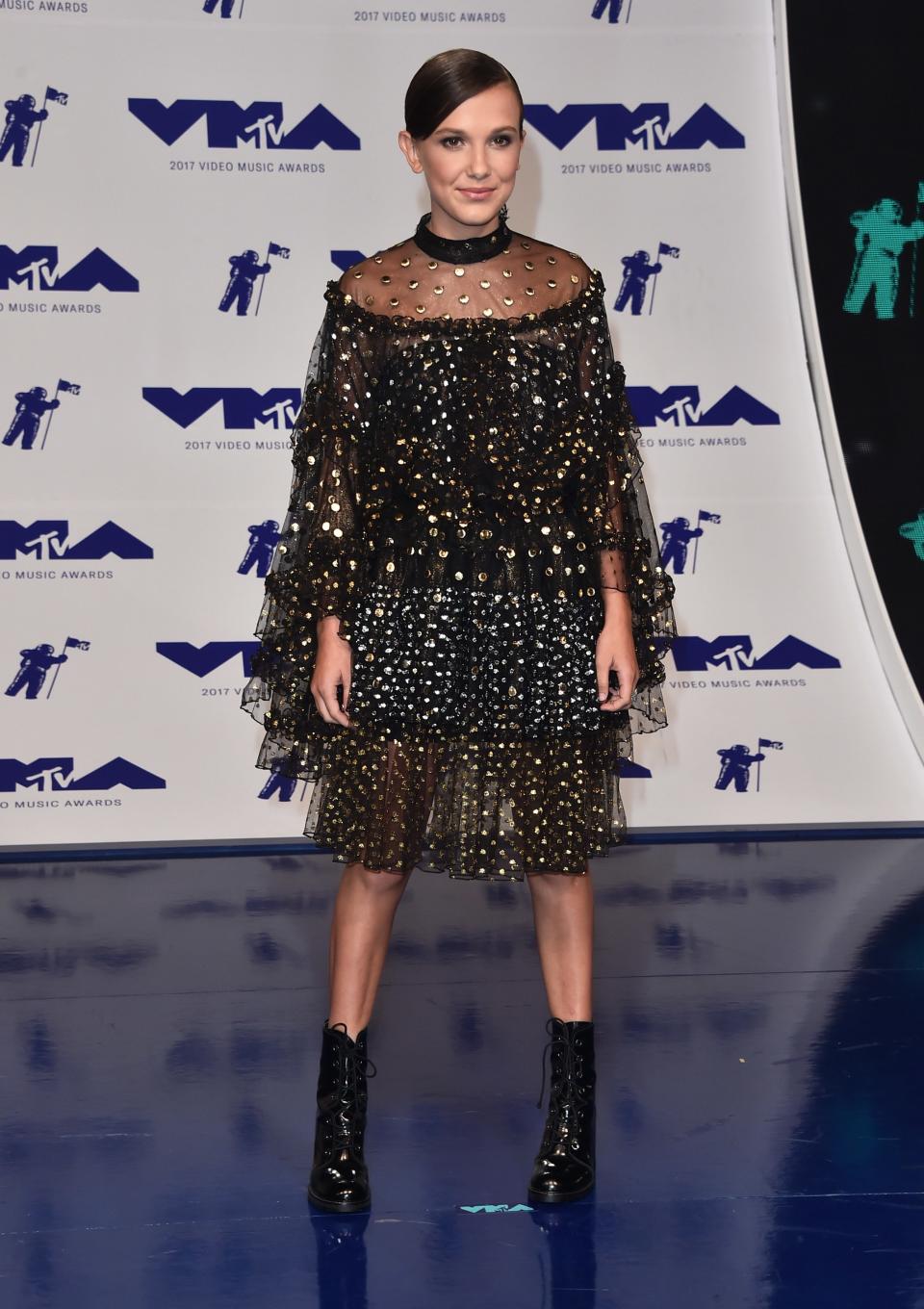 Millie Bobby Brown in Rodarte and Stuart Weitzman shoes