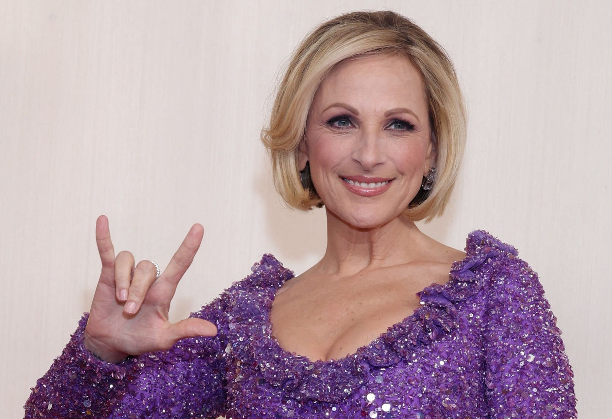 Marlee Matlin offers a sign at the 96th Academy Awards in March. The Oscar-winning actress and advocate for people with disabilities will headline the Junior League of Sarasota's 22nd annual Legacy Luncheon in February.