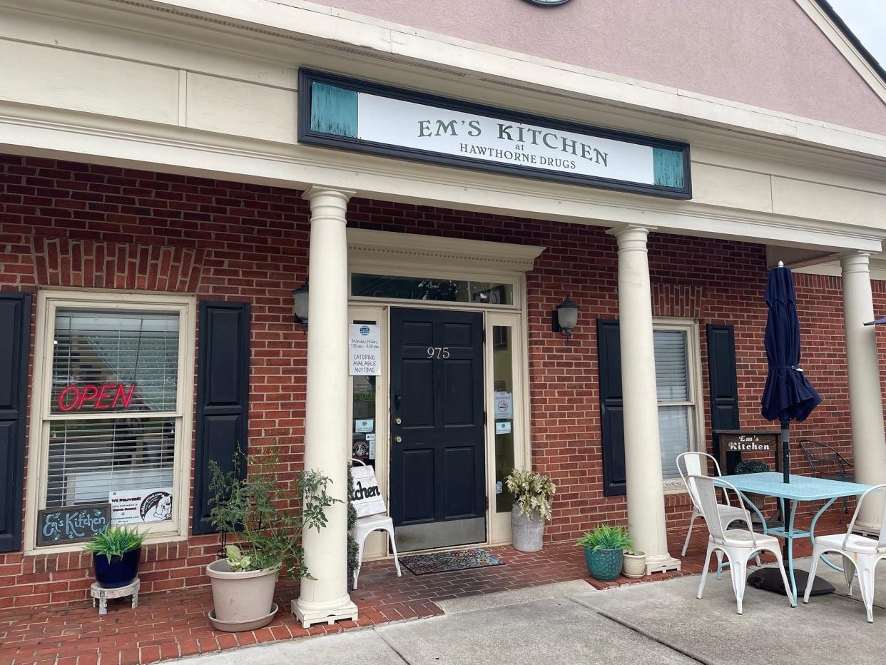 The entrance for Em's Kitchen in Athens, Ga. on Tuesday, Aug. 29, 2023. The restaurant began as a soda fountain in Hawthorne Drugs, which is right next door.