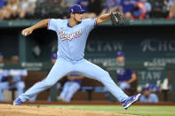 Texas Rangers starting pitcher Dane Dunning delivers in the third inning against the Minnesota Twins in a baseball game Sunday, June 20, 2021, in Arlington, Texas. (AP Photo/Richard W. Rodriguez)