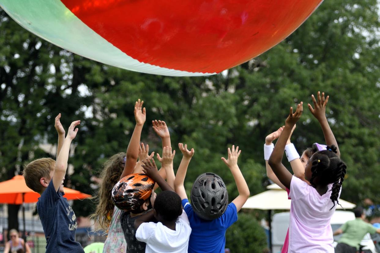 <span class="caption">Play is especially important during the summer months, when kids tend to be less active.</span> <span class="attribution"><a class="link " href="https://www.gettyimages.com/detail/news-photo/children-play-with-a-large-beach-ball-as-residents-news-photo/1015477748" rel="nofollow noopener" target="_blank" data-ylk="slk:Bastiaan Slabbers/NurPhoto via Getty Images;elm:context_link;itc:0;sec:content-canvas">Bastiaan Slabbers/NurPhoto via Getty Images</a></span>