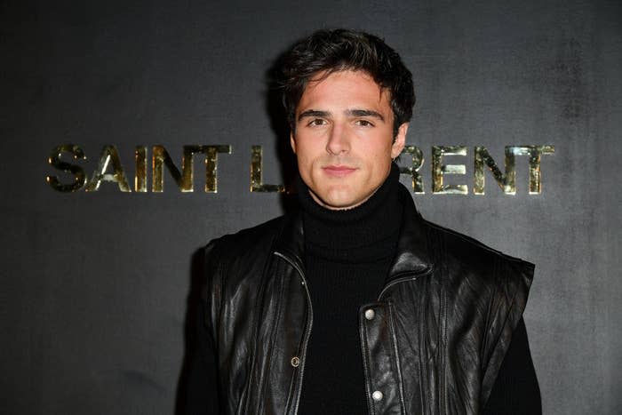 Jacob Elordi on the red carpet wearing a turtle neck and a leather jacket