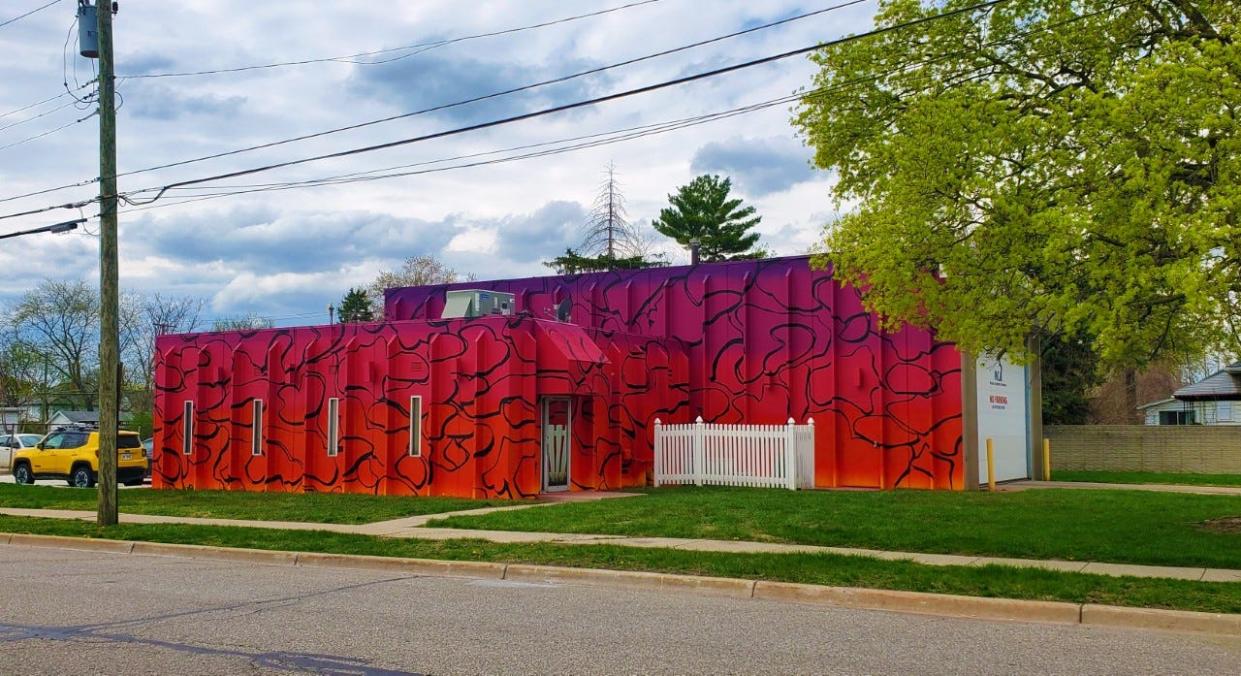 The finished mural painted at Monroe Community Ambulance's station at East First Street and Conant Avenue in downtown Monroe is pictured. The mural was painted by Detroit-based artist and entrepreneur Rick Williams.