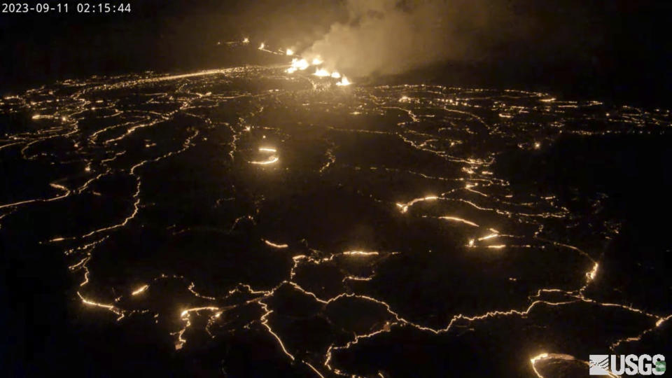 In this screen grab from webcam video provided by the U.S. Geological Survey, Kilauea, one of the most active volcanoes in the world, erupts in Hawaii, early Monday, Sept. 11, 2023. (U.S. Geological Survey via AP)